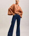 Toxik3 stretch flare jeans with cutouts and pockets