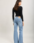 Pantalones vaqueros bootcut de denim elástico Toxik3 Tamaño bajo