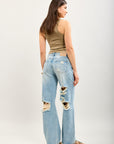Toxik3 wide jeans with holes at the back