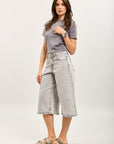 Raw blue low-rise Bermuda shorts