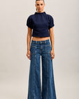 Weite Stretch-Jeanshose von Toxik3 mit Ausschnitten und Taschen