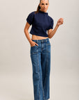 Weite Stretch-Jeanshose von Toxik3 mit Ausschnitten und Taschen