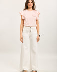 Pantalón ancho Toxik3 en denim elástico con botones decorados