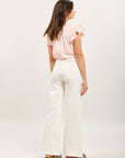 Pantalón ancho Toxik3 en denim elástico con botones decorados