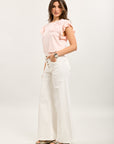 Pantalón ancho Toxik3 en denim elástico con botones decorados