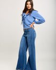 Toxik3 stretch flare jean pants with metal eyelets and lacing