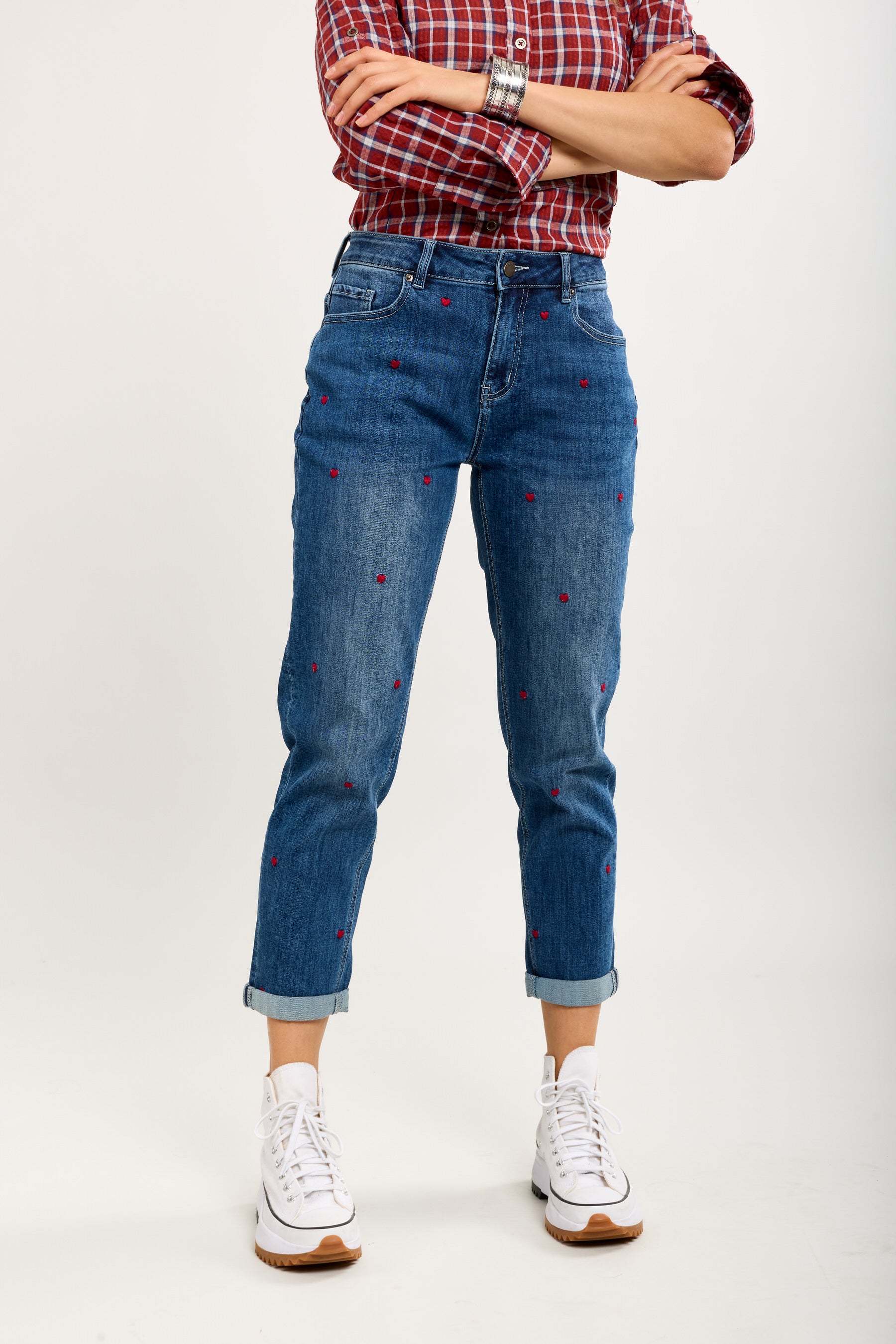 Toxik3 washed stretch boy jeans with heart embroidered cuffs