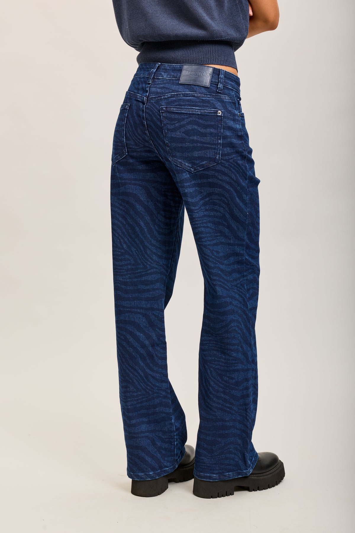 Toxik3 straight jeans with faded zebra pattern