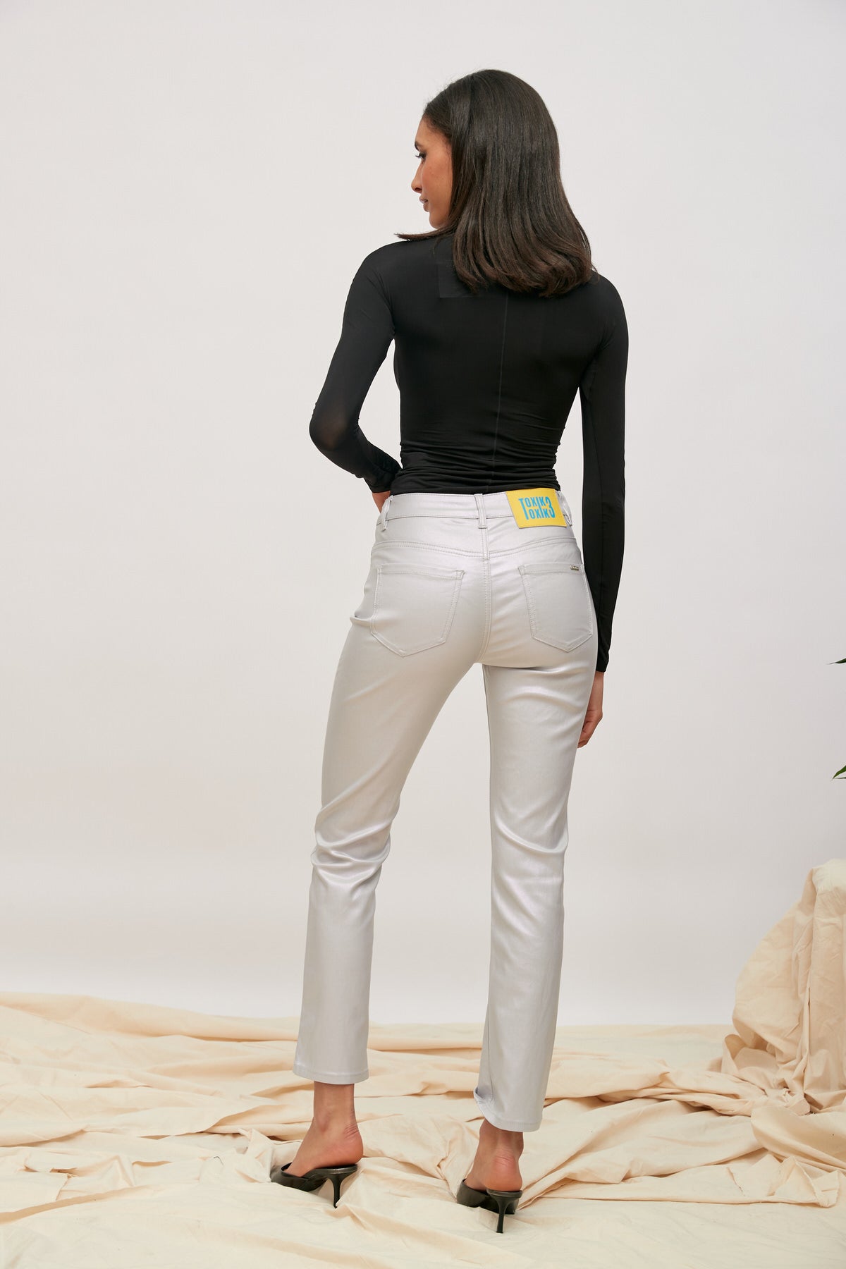 Pure Glow - pantalones de recubrimiento brillantes