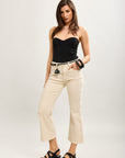 Toxik3 pantalon jean bootcut cropped clous latéraux accessoire ceinture