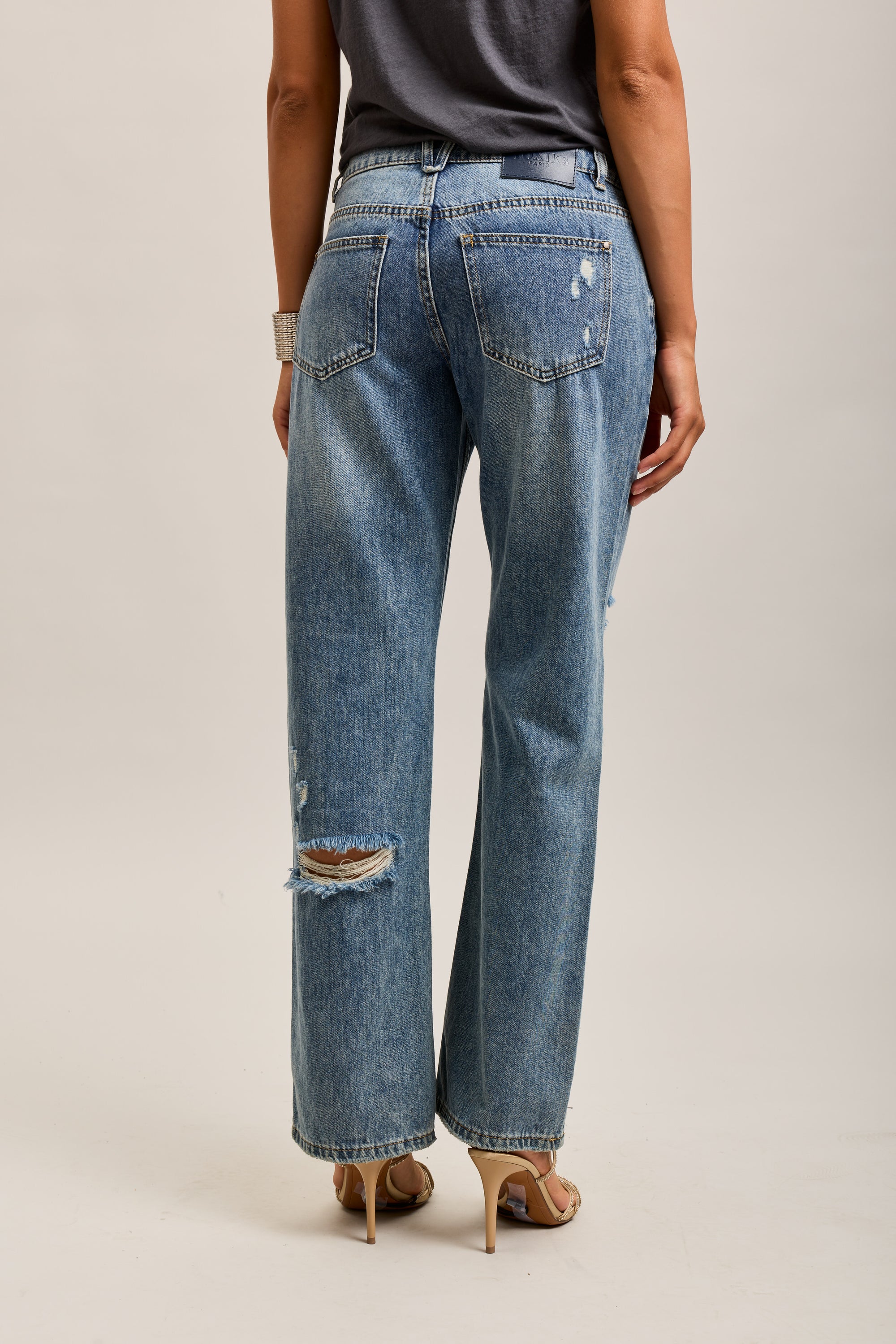 Toxik3 pantalones vaqueros rectos elásticos desgastados
