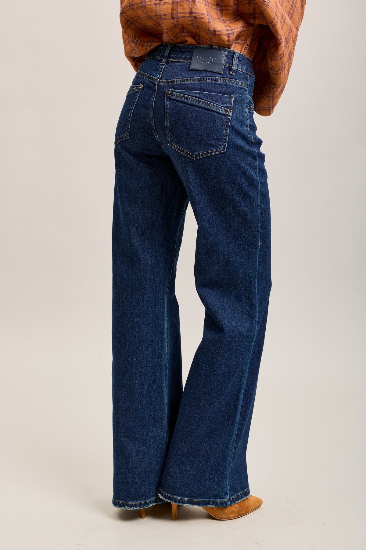 Toxik3 stretch flare jeans with cutouts and pockets