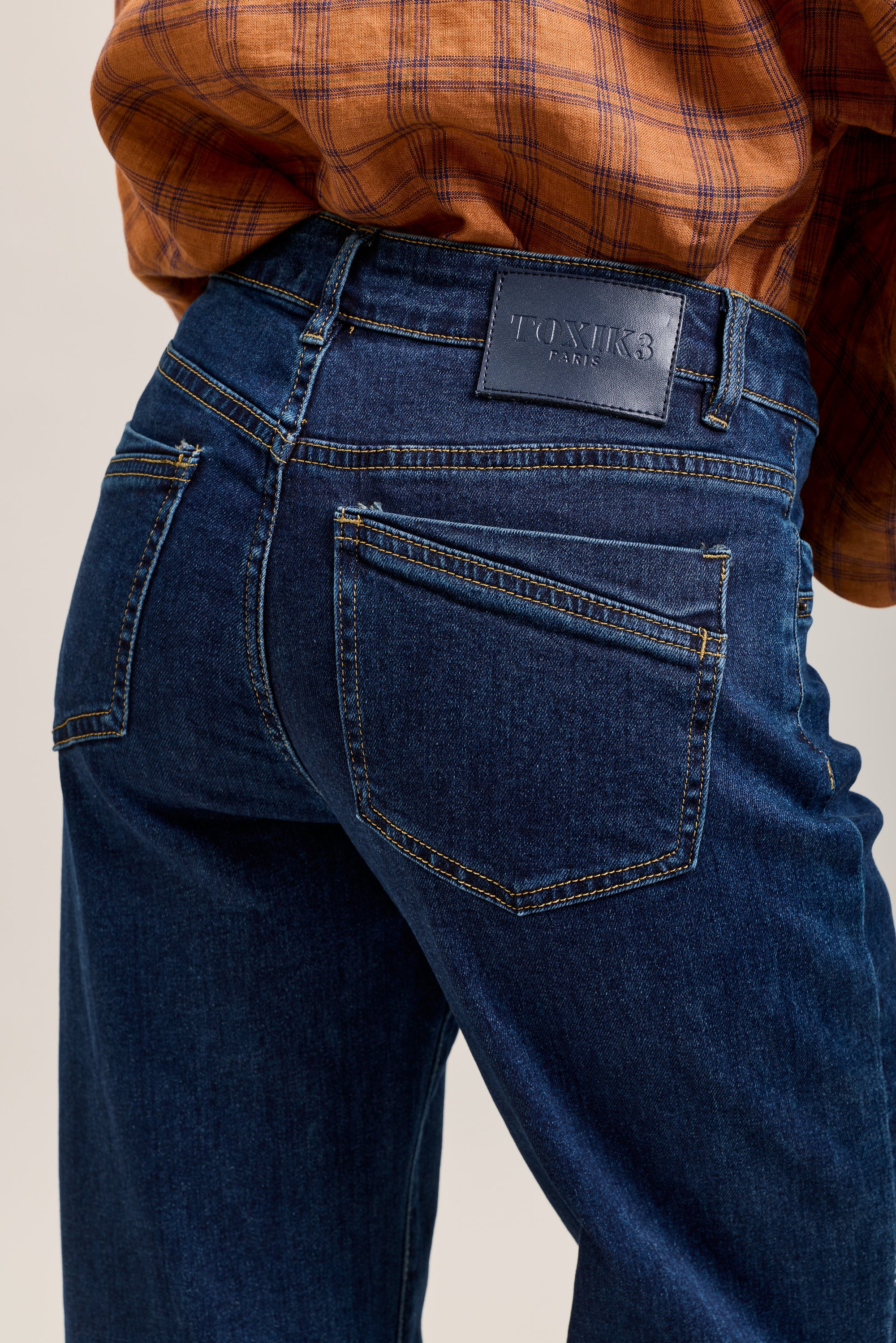 Toxik3 stretch flare jeans with cutouts and pockets