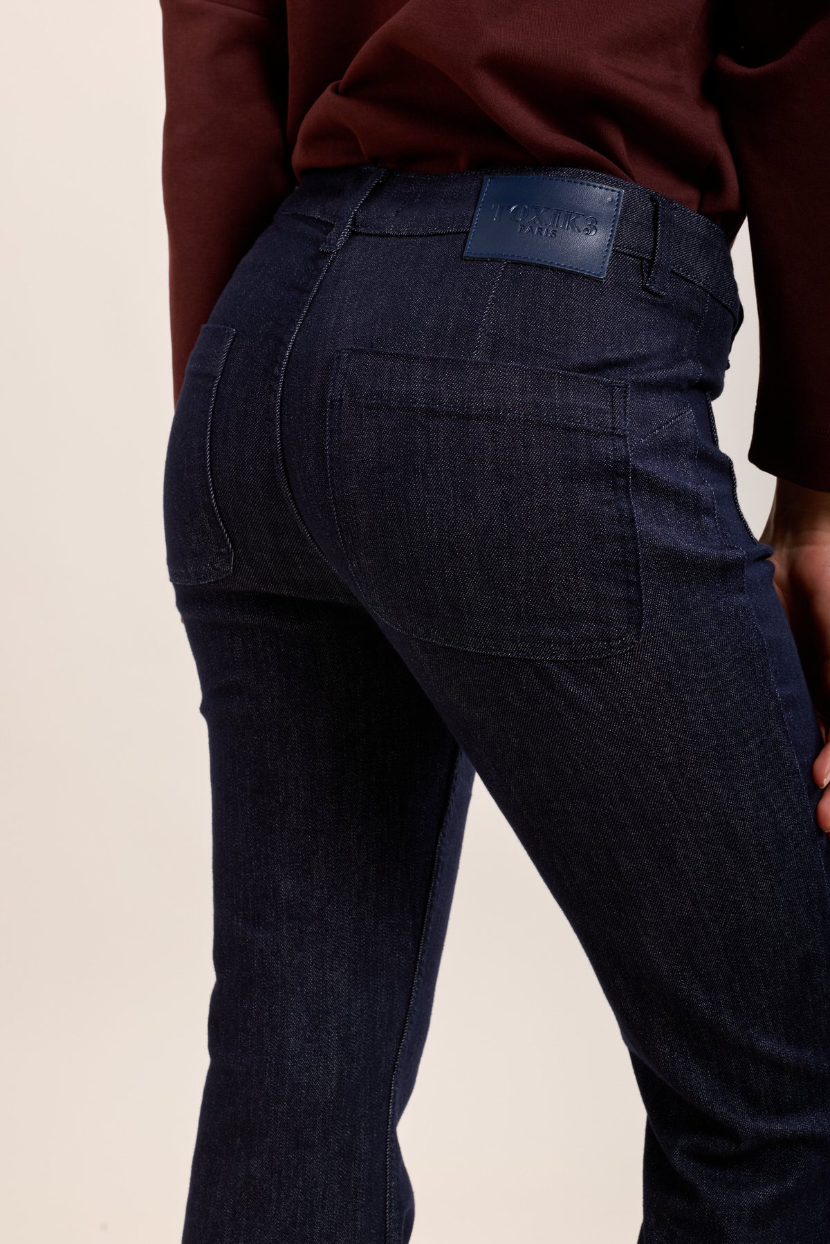 Toxik3 jean flare à boutons dorés