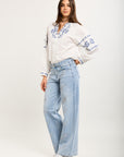 Toxik3 wide stretch denim pants with rhinestone details