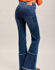 Pantalones vaqueros bootcut de denim elástico Toxik3 con bajo deshilachado