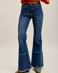 Pantalones vaqueros bootcut de denim elástico Toxik3 con bajo deshilachado