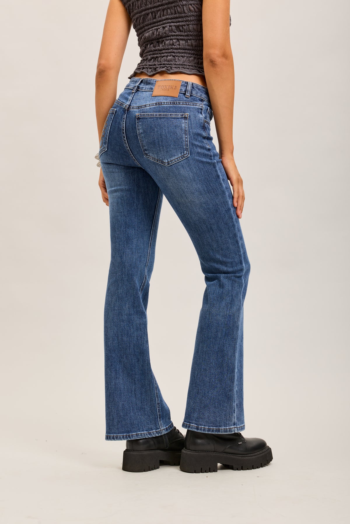 Toxik3 stretch denim bootcut jean pants with topstitched pattern