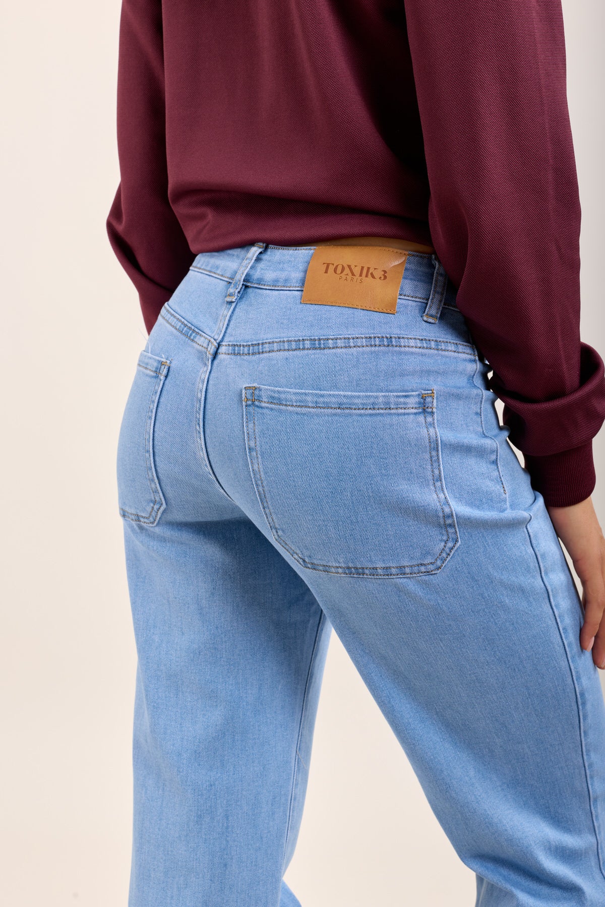 Toxik3 jean flare taille haute à pont boutons or