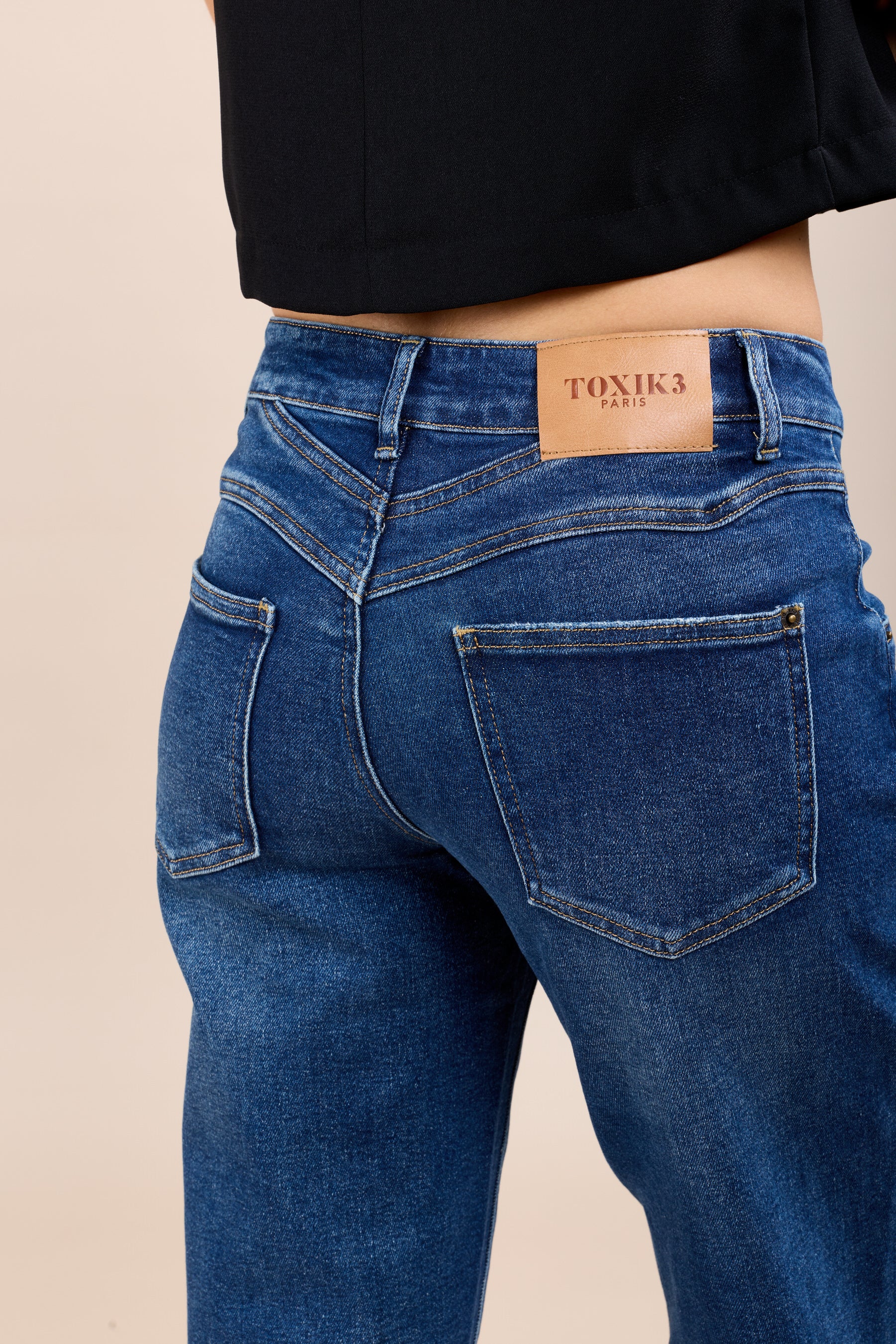 Toxik3 stretch boyfriend jeans with cutouts and cuffs