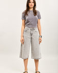 Raw blue low-rise Bermuda shorts