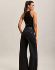 Weite Stretch-Jeanshose von Toxik3 mit Ausschnitten und Taschen