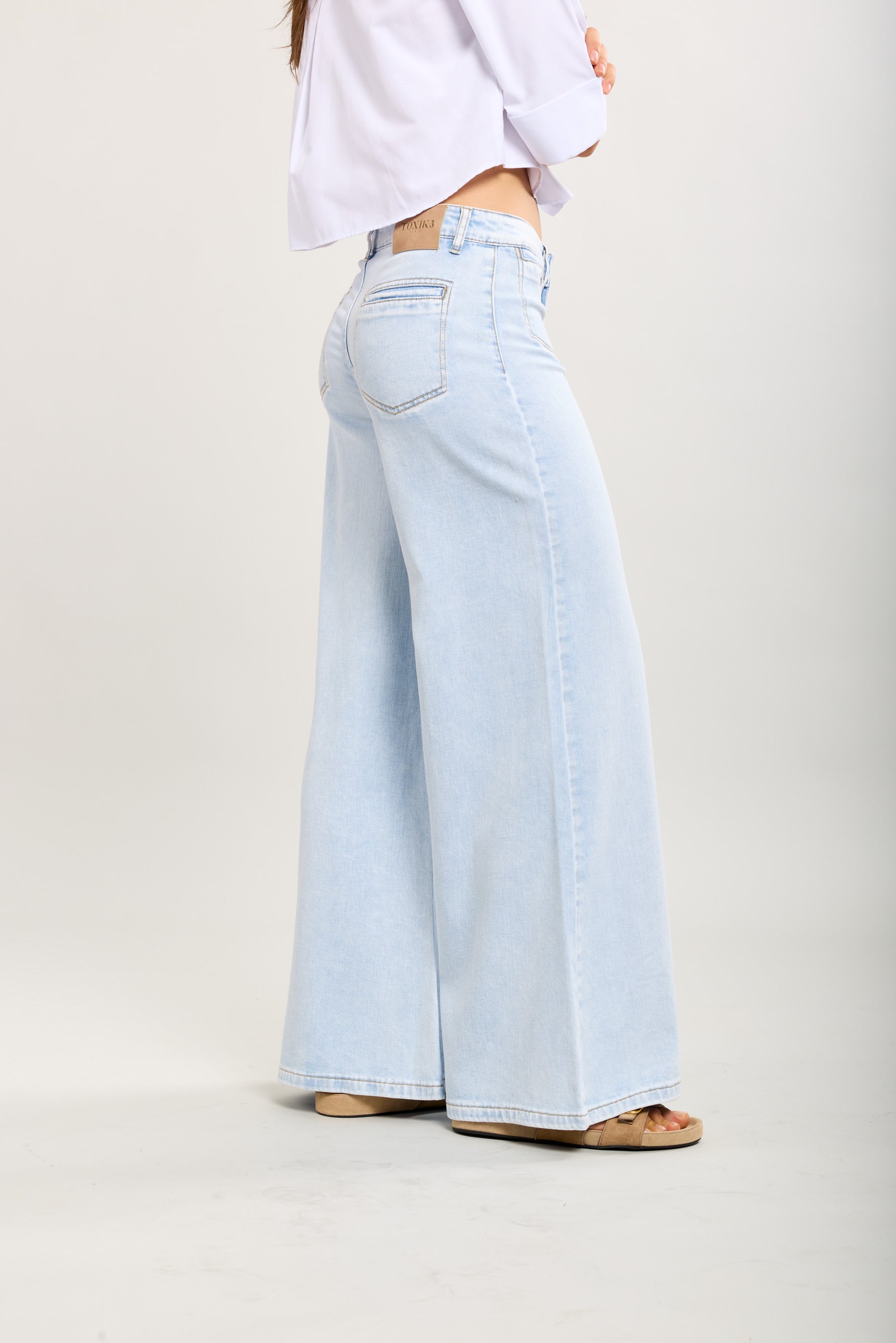 Toxik3 pantalon palazzo extra-wide poches avant boutonnées