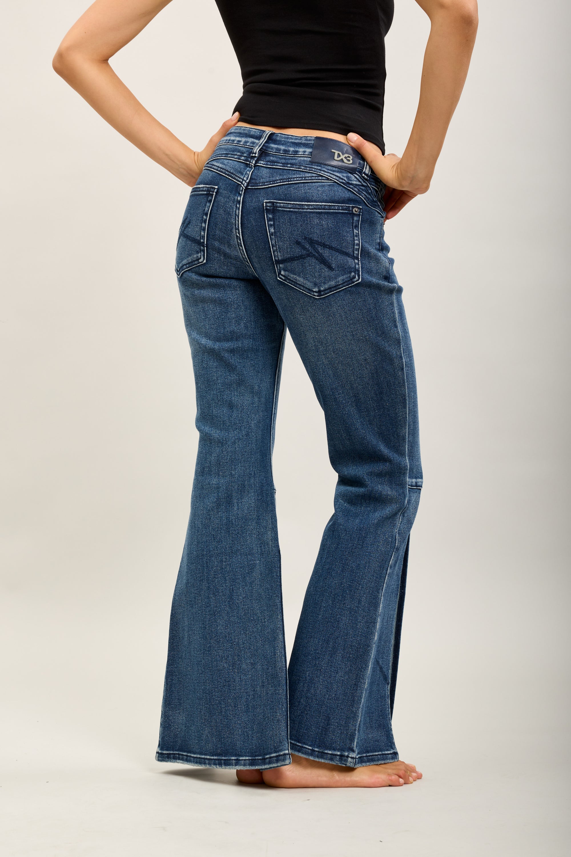 Pantalones vaqueros bootcut de denim elástico Toxik3 con aberturas