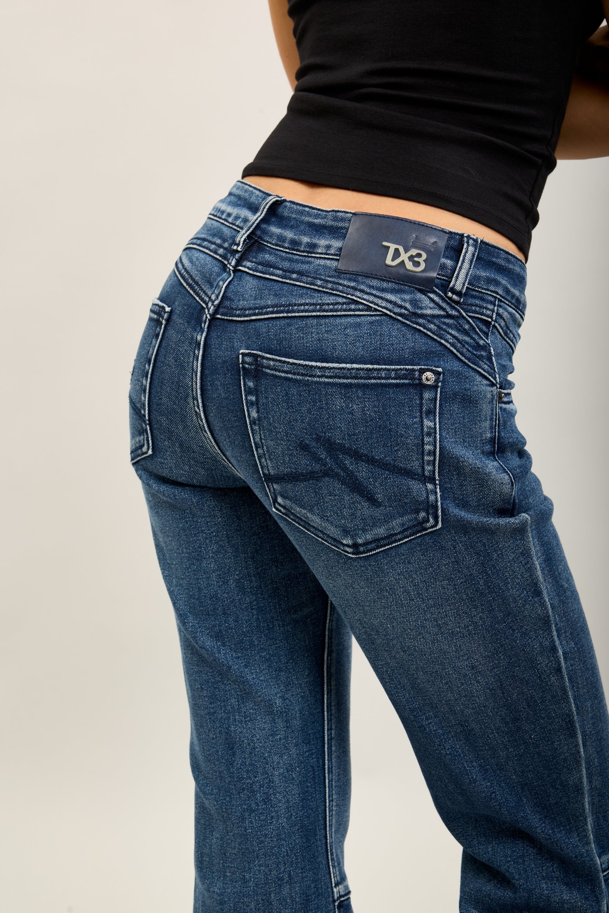 Pantalones vaqueros bootcut de denim elástico Toxik3 con aberturas