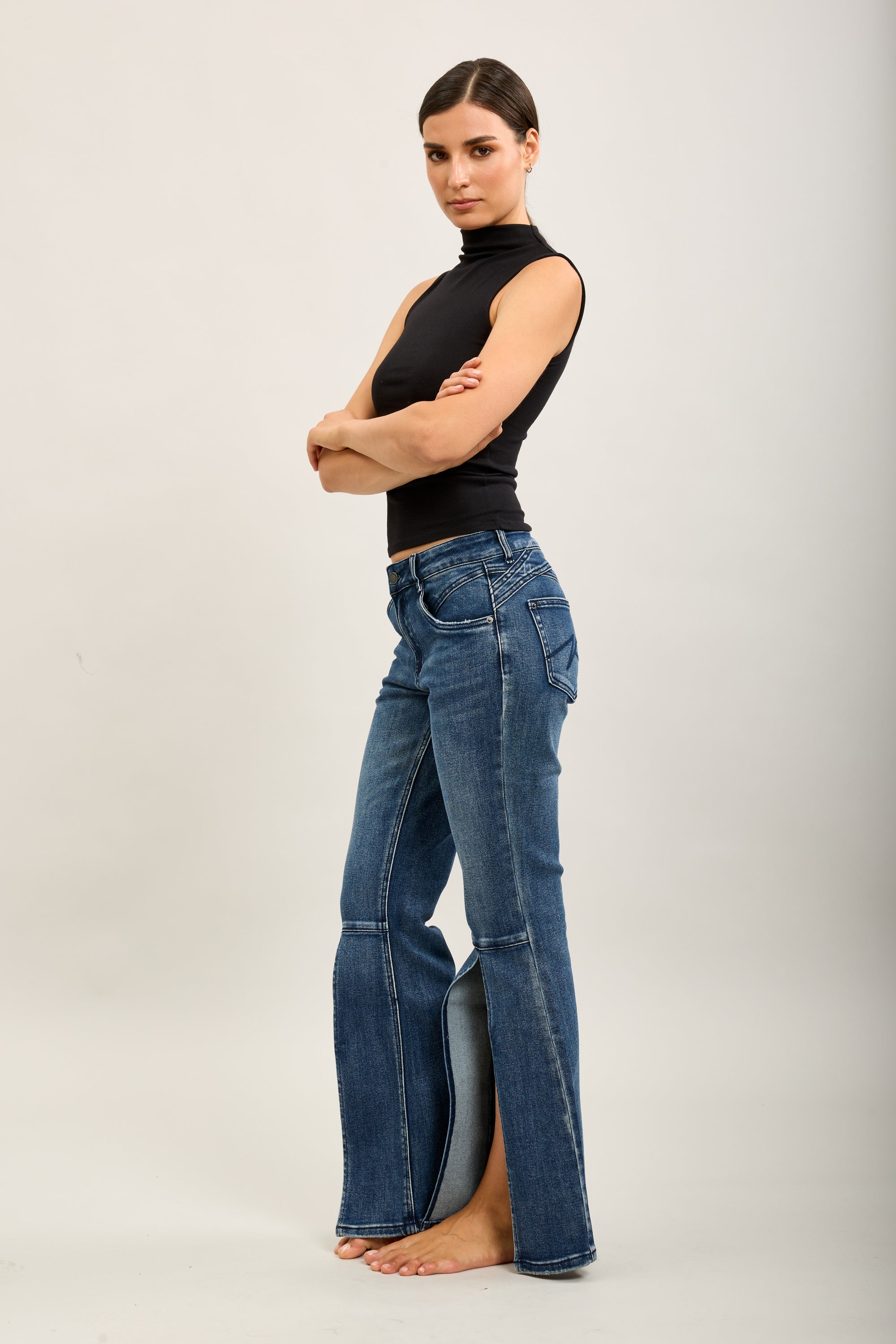 Pantalones vaqueros bootcut de denim elástico Toxik3 con aberturas