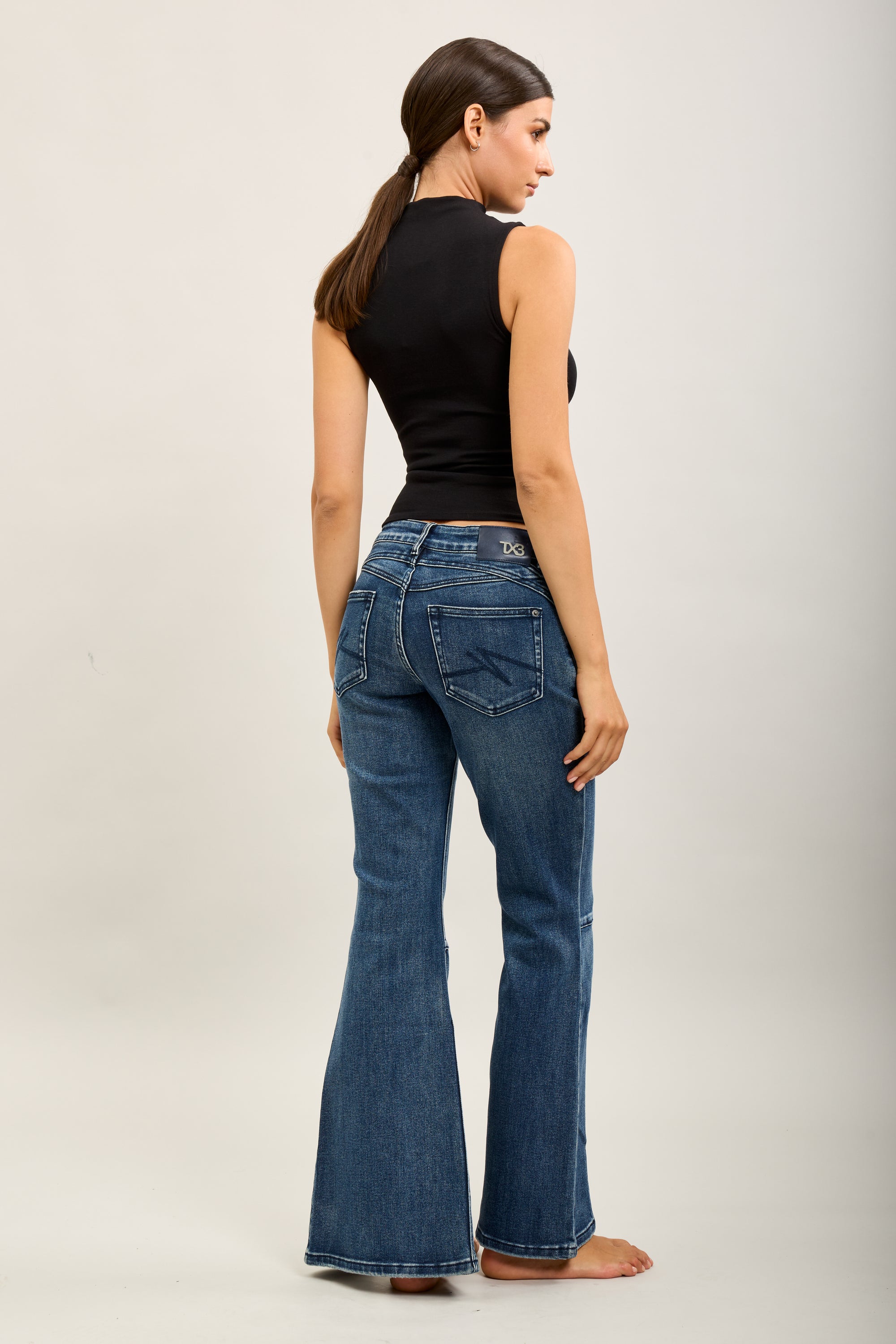 Pantalones vaqueros bootcut de denim elástico Toxik3 con aberturas