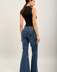 Pantalones vaqueros bootcut de denim elástico Toxik3 con aberturas
