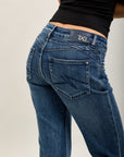Pantalones vaqueros bootcut de denim elástico Toxik3 con aberturas