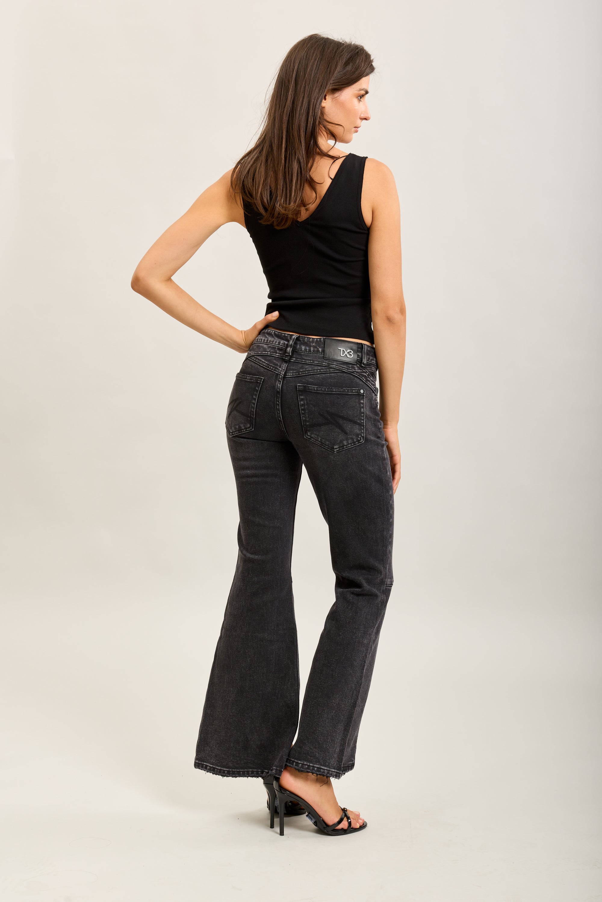 Pantalones vaqueros bootcut de denim elástico Toxik3 con aberturas