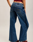 Toxik3 pantalones vaqueros extra anchos asimétricos de denim elástico