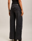Toxik3 pantalones vaqueros extra anchos asimétricos de denim elástico
