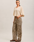 Toxik3 pantalones vaqueros globo de denim elástico con estampado de leopardo