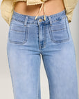 Toxik3 Stretch weite Jeanshose mit kleinen Taschen