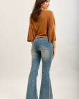 Toxik3 pantalon jean bootcut délavé denim stretch brodée